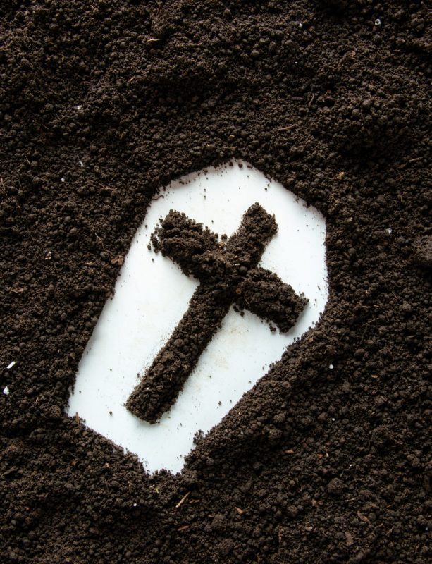 top-view-coffin-shape-with-cross-brown-soil top-view-coffin-shape-with-cross-brown-soil